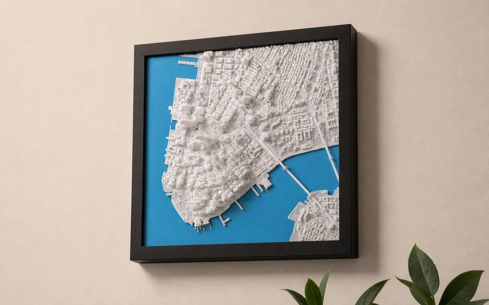 Personalisierte 3D-Stadtkarte einer Metropole in einem schwarzen Bilderrahmen